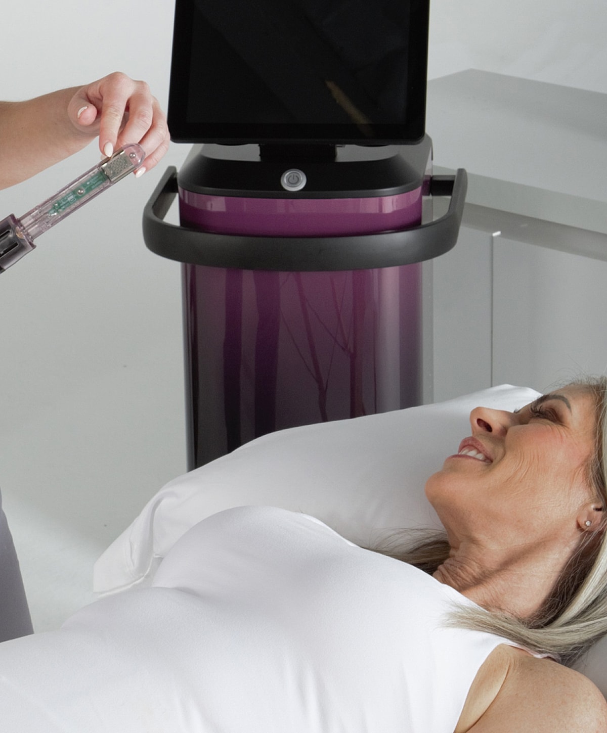 Woman receiving a beauty treatment in clinic.