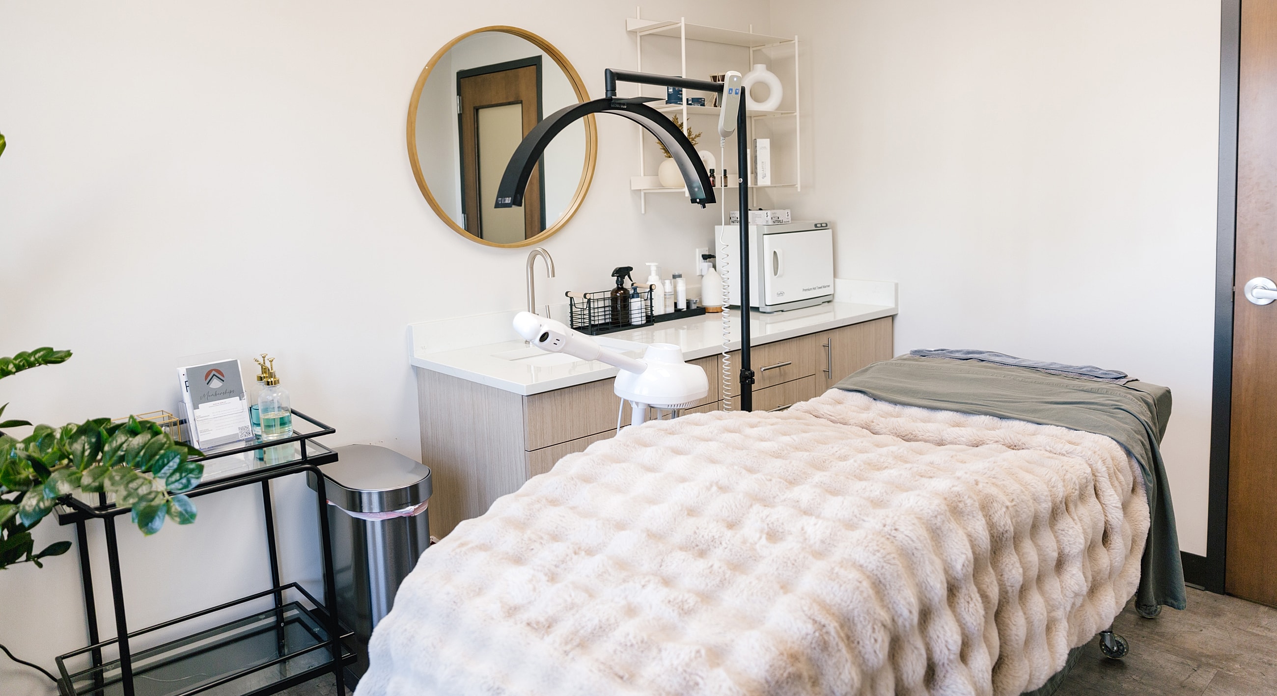 Well-equipped beauty treatment room with cozy ambiance.