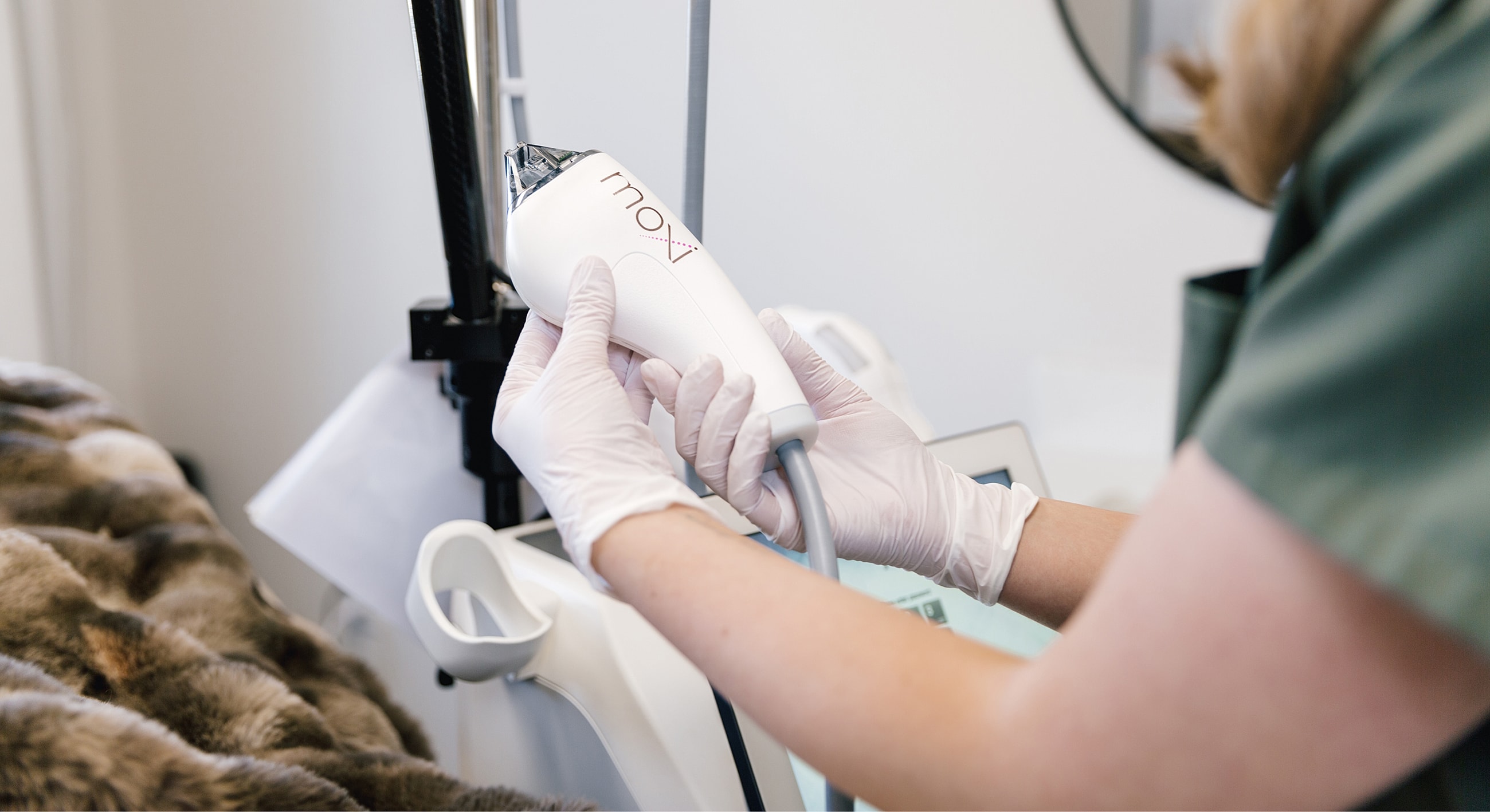 Moxi laser treatment device in use.